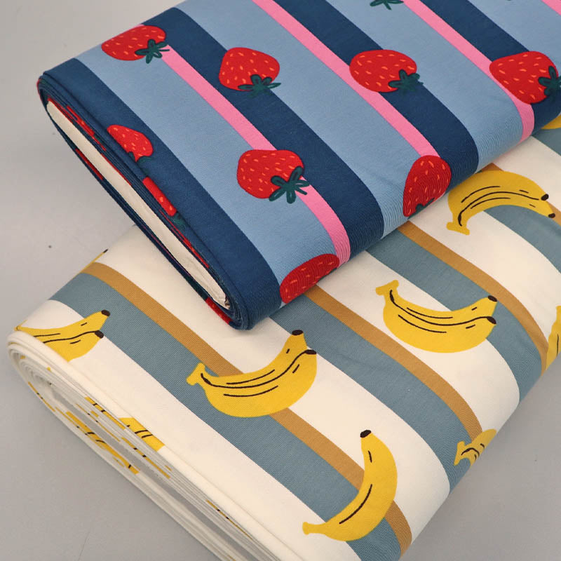Striped cotton jersey fabrics with a banana print and a strawberry print