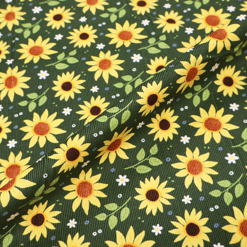 Green Floral Needlecord Fabric - yellow sunflowers