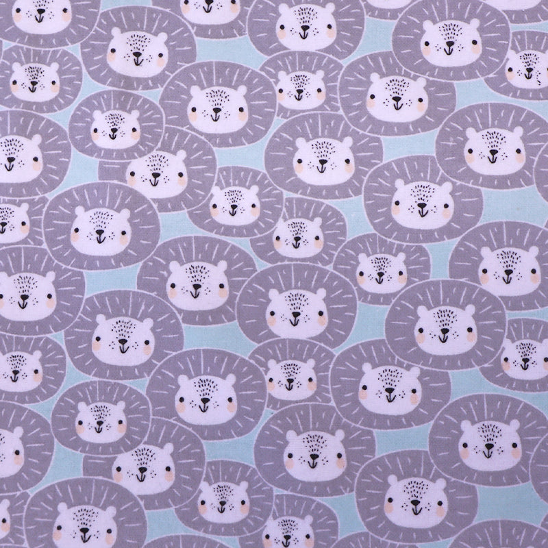 Grey and blue brushed cotton flannel fabric with children's lion print