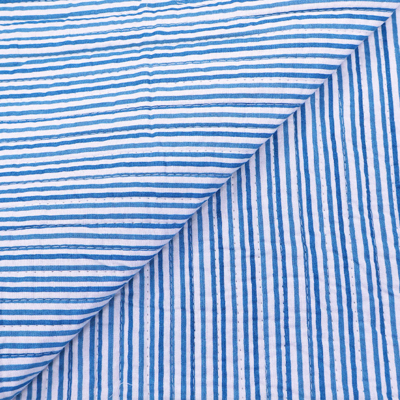 100% Cotton, including 100% Cotton Wadding Quilted Cotton Fabric - Blue Floral and Stripe on reverse