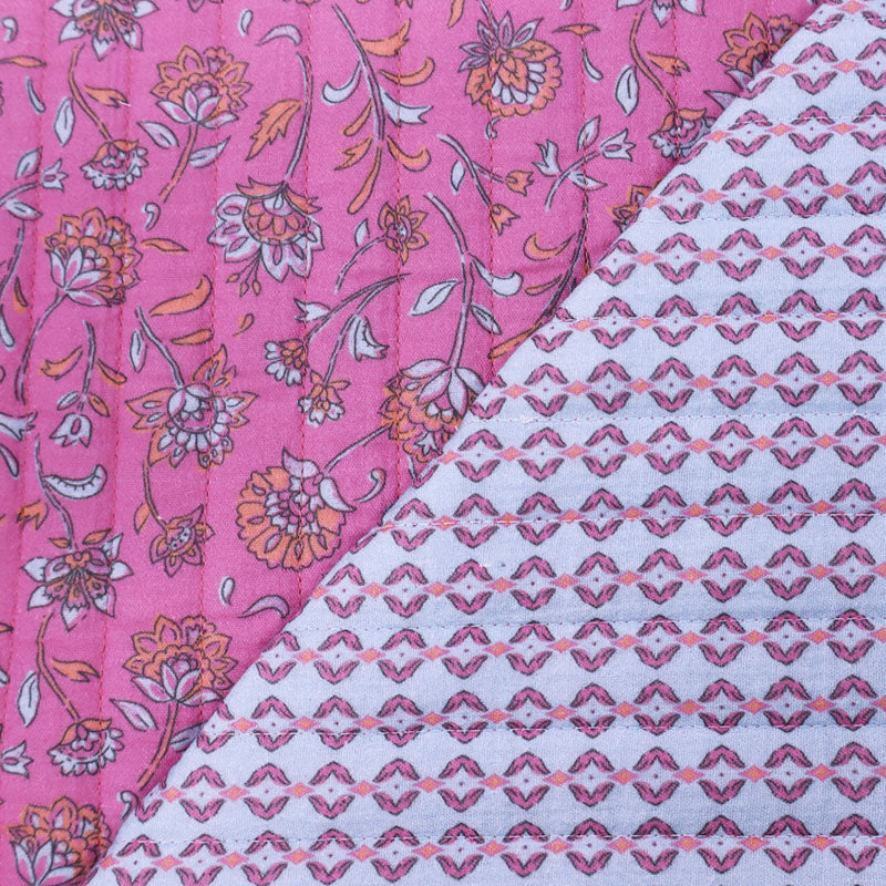 75% Cotton 25% Polyester Pink Floral Quilted Double Gauze Fabric with geometric design on the reverse