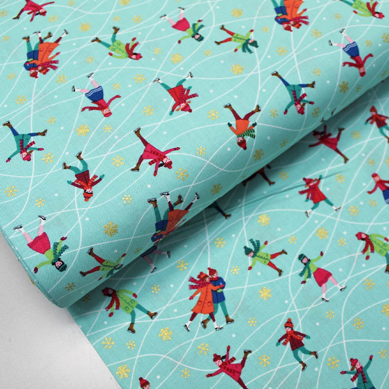 Turquoise Blue Ice Skating Print Christmas Fabric