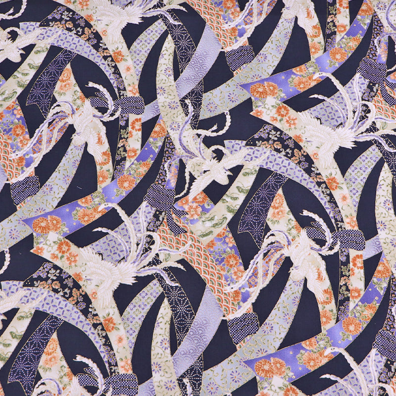 Japanese fabric featuring an intricate design of doves and floral ribbons on a dark blue background. In 100% cotton