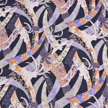 Japanese fabric featuring an intricate design of doves and floral ribbons on a dark blue background. In 100% cotton
