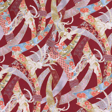 Japanese fabric featuring an intricate design of doves and floral ribbons on a rust red background. In 100% cotton
