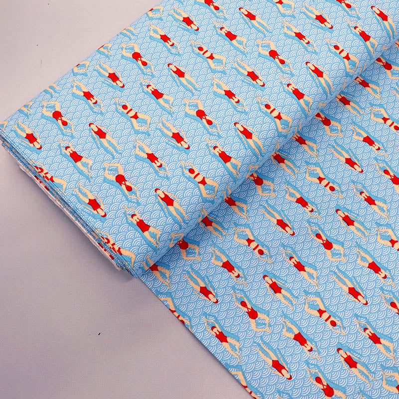 100% Cotton Fabric - Red Swimmers in Pale Blue Swimming Pool