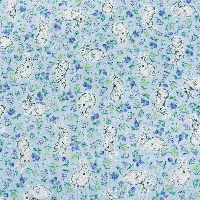 blue linen look cotton fabric with a cute rabbit and floral print