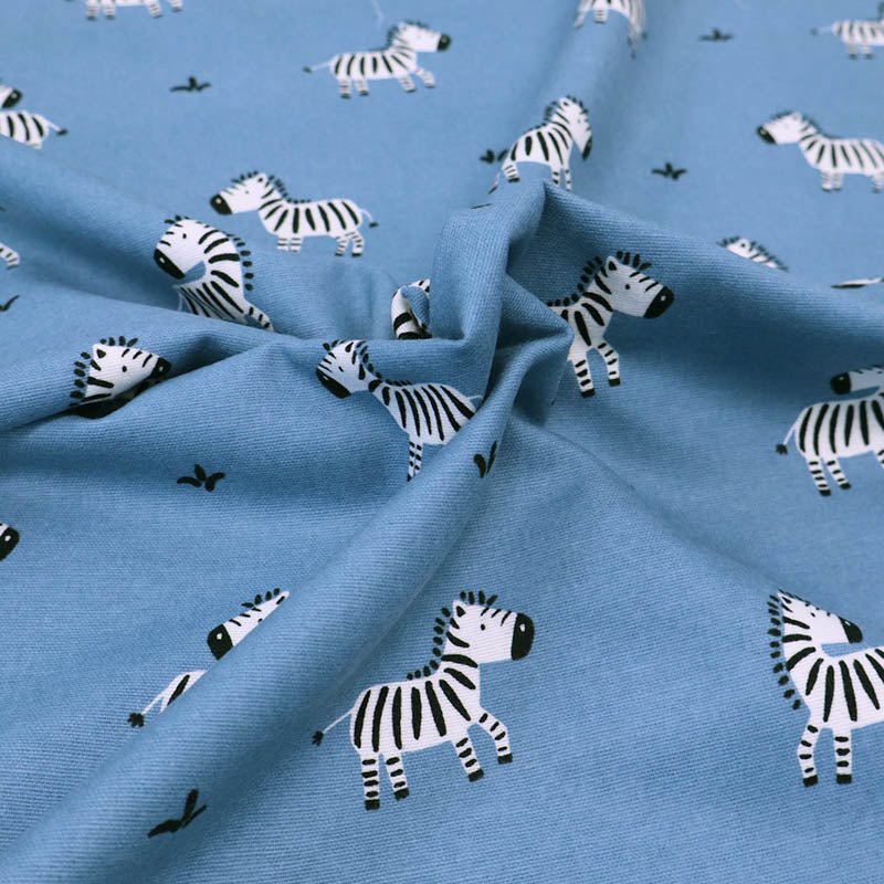 100% Cotton Blue Brushed Cotton Fabric - Zebra Print