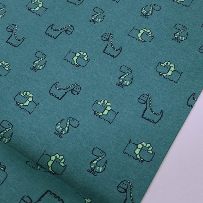 100% Cotton Brushed Cotton fabric - Green Dinosaur Print