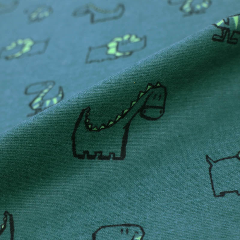 100% Cotton Brushed Cotton fabric - Green Dinosaur Print