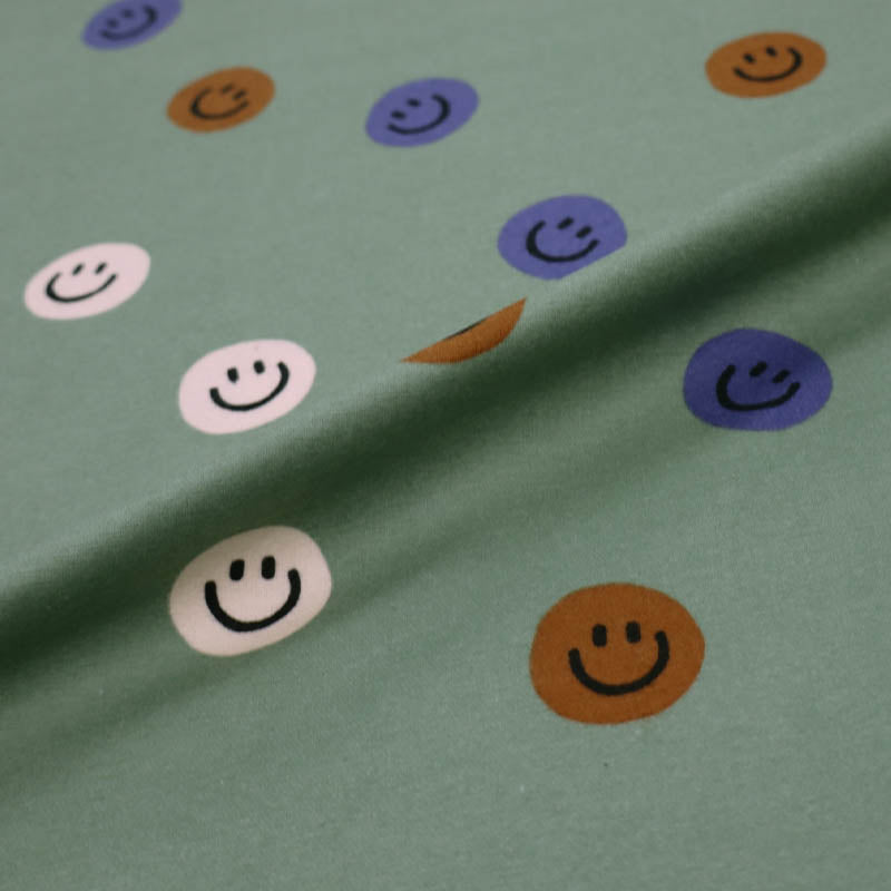 100% Cotton Green Brushed Cotton Fabric - Smiley Faces