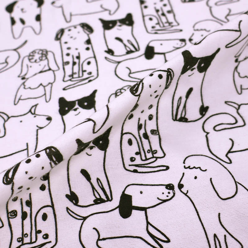 100% Cotton White Brushed Cotton Fabric - Black and White Dog print