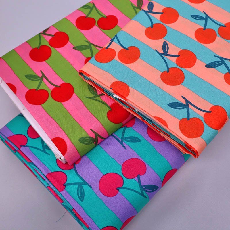 Cherry print poplin fabrics in 3 colourways