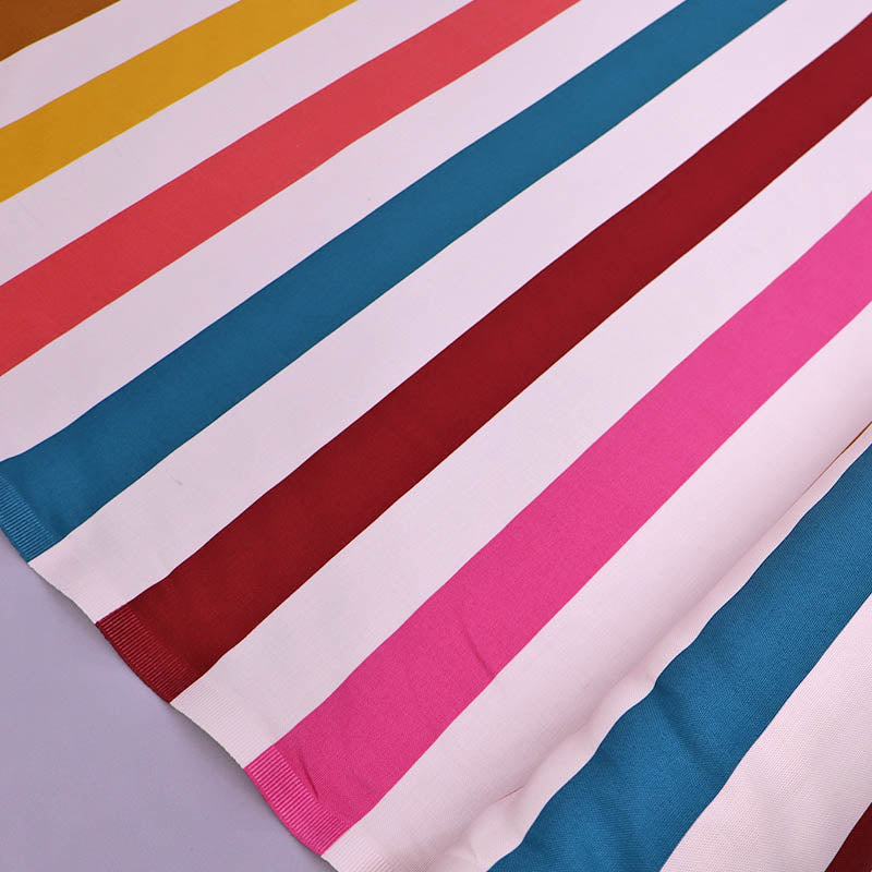 100% Cotton Multicolour Striped Canvas Fabric with bold stripes of white, yellow, coral pink, burgundy and blue