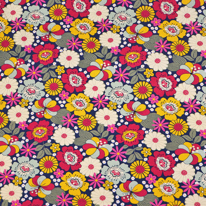 95% Cotton 5% Elastane  pink floral jersey fabric by The Crafty Pie featuring a pink, red, yellow and blue floral print on dark navy blue jersey