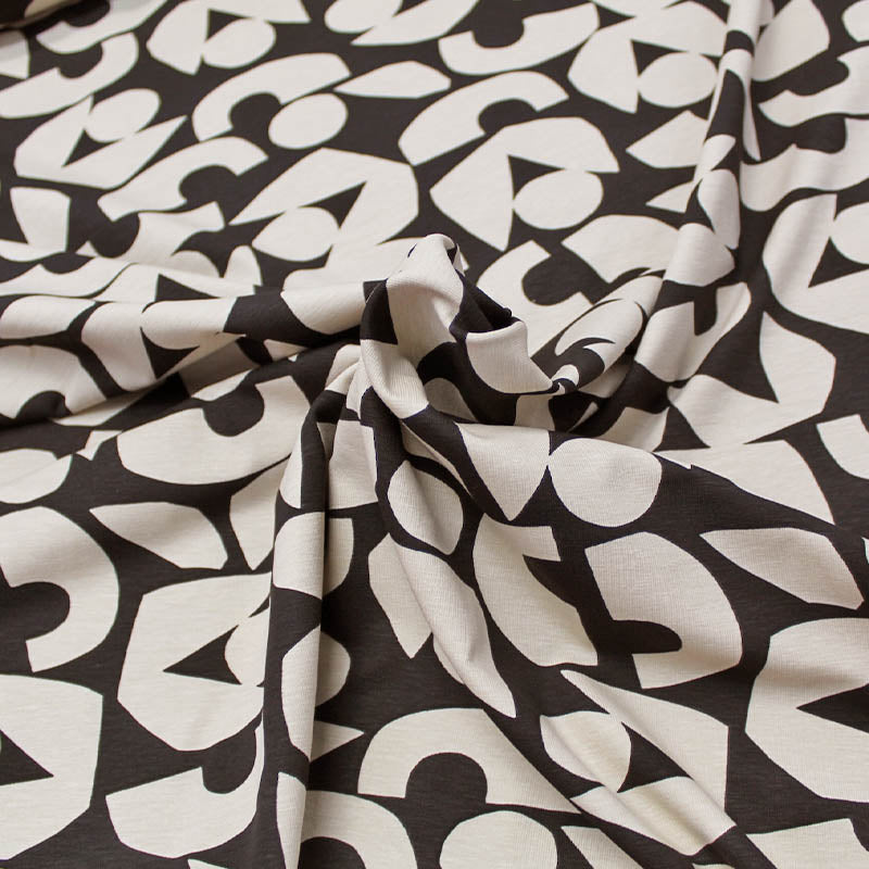 Black and Putty Bold Print Jersey Fabric Fabrics Galore