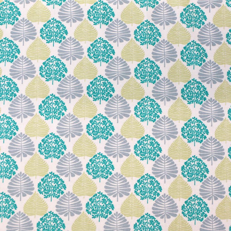 92% Cotton 8% Elastane Cotton Jersey Fabric - Green Leaves on a white background