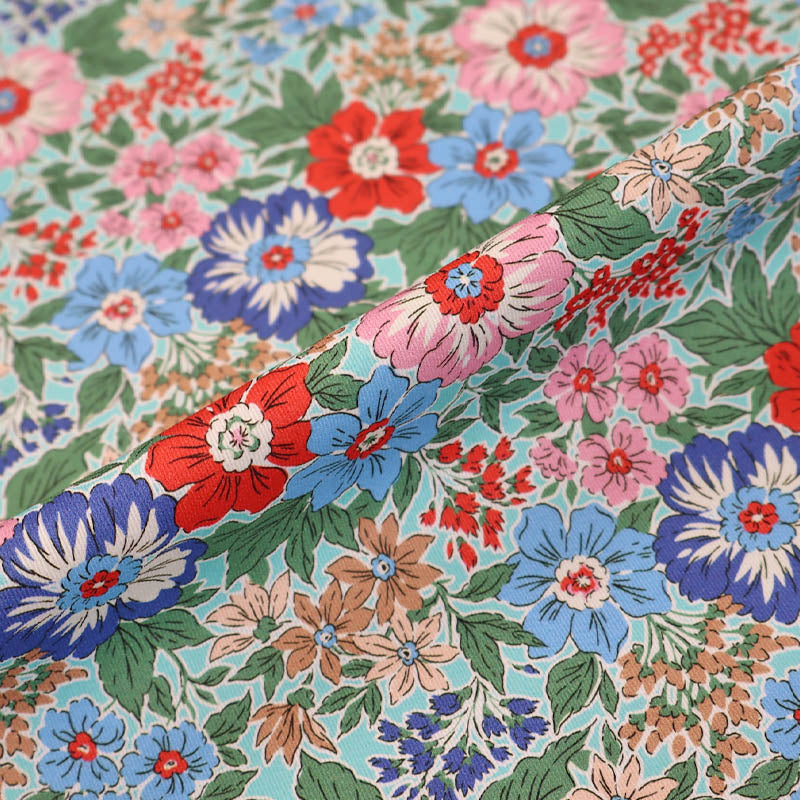 100% Cotton Gabardine Fabric - Blue Floral with Pink and Red flowers