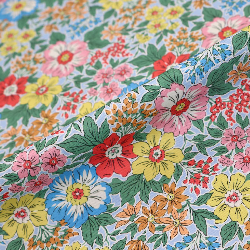 100% Cotton Gabardine Fabric - Yellow Floral with blue and pink flowers