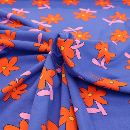 95% Organic Cotton 5% Elastane
Blue Floral Jersey Fabric with Red Daisy