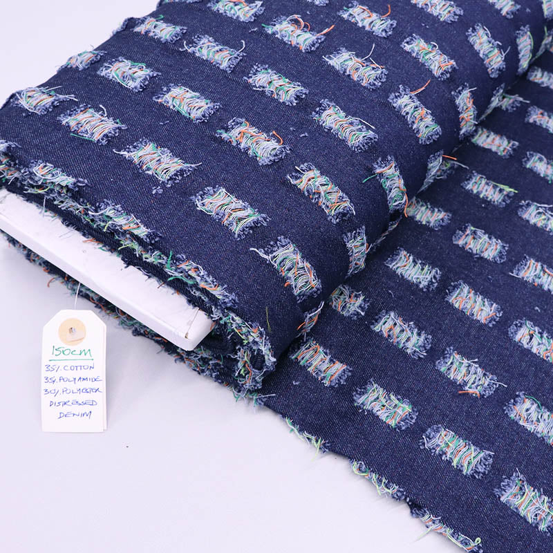 75% Cotton 25% Polyester Striped Denim Fabric - Dark Blue with different multi-coloured rectangular stripes of tufted threads