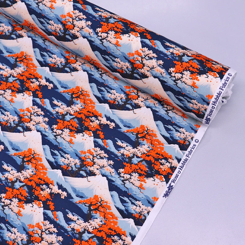 100% Cotton Poplin Fabric - Mountain and Cherry Blossom Print in blue and orange