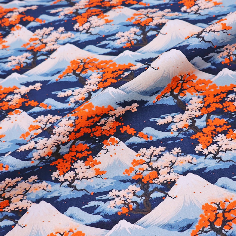 100% Cotton Poplin Fabric - Mountain and Cherry Blossom Print in blue and orange