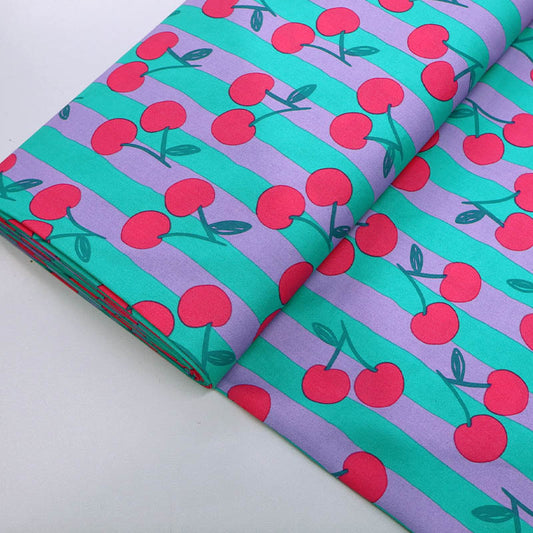 100% Cotton Poplin Fabric - Cherry Print
with red cherry print on a purple and green striped background.