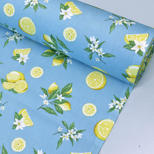 100% Cotton Pale Blue Poplin Fabric - Lemon Print