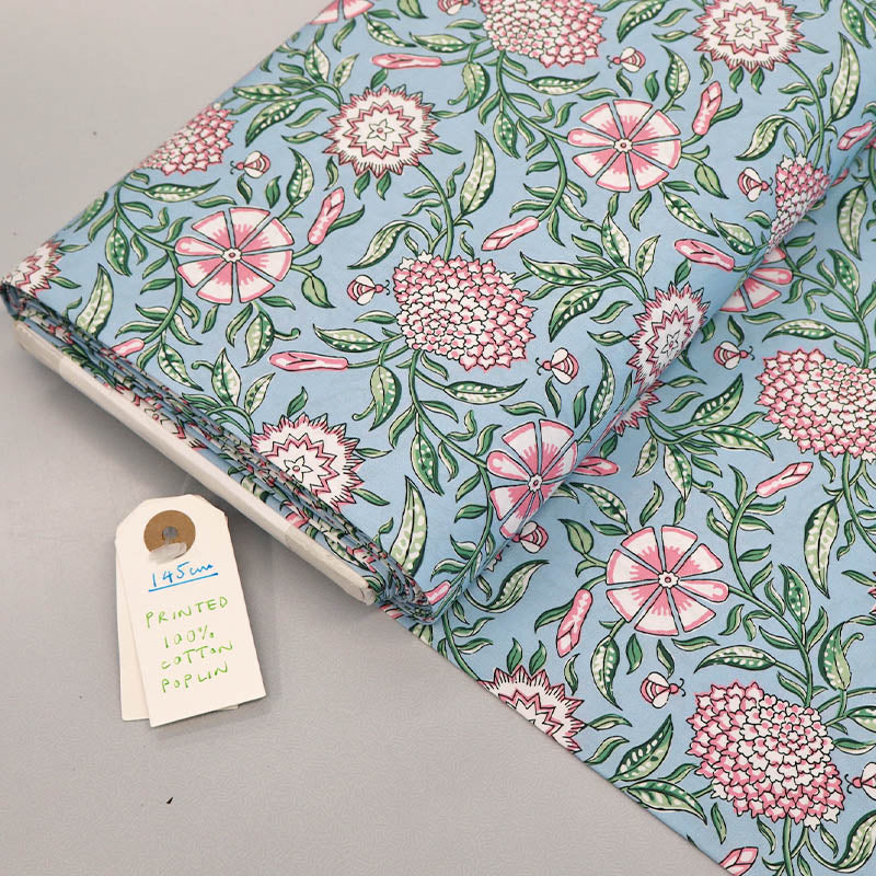 100% Cotton Poplin Fabric - Pale Pink and White Floral and Bee Print on a pale blue background