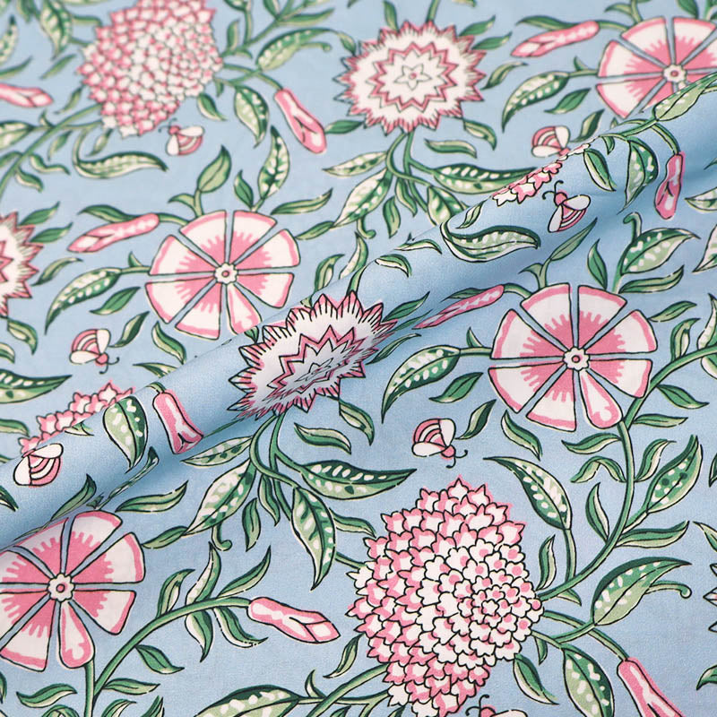 100% Cotton Poplin Fabric - Pale Pink and White Floral and Bee Print on a pale blue background
