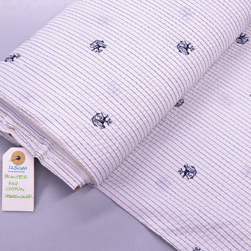 100% Cotton Deadstock Seersucker Fabric - Blue and Cream Stripe with dog and anchor pattern