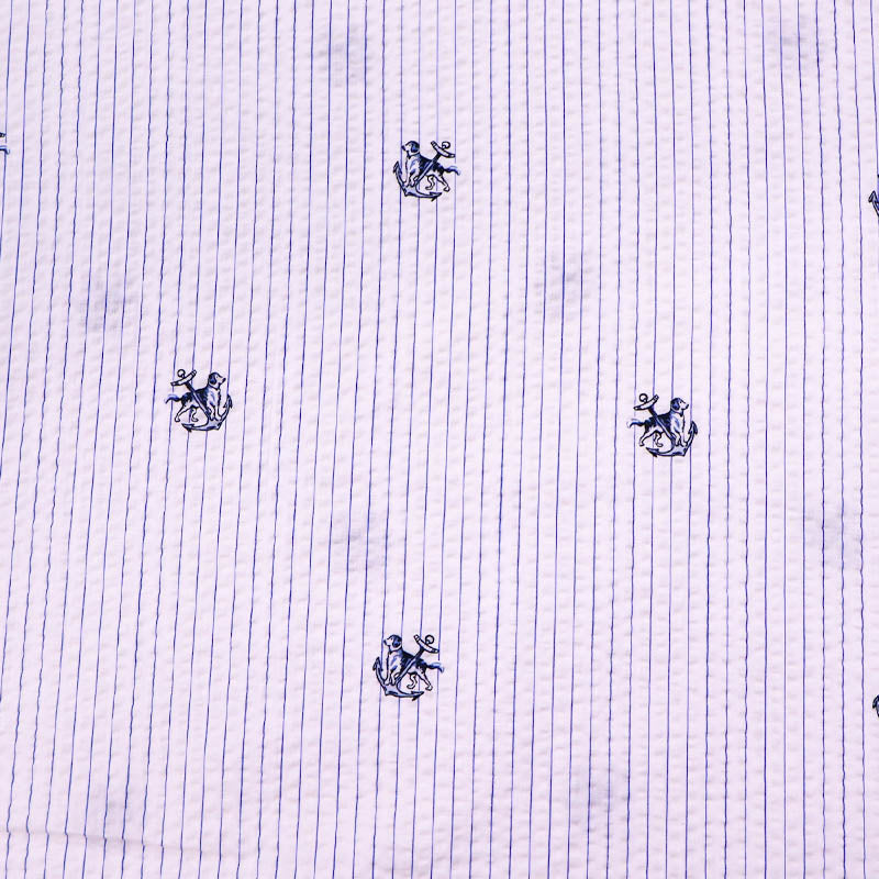 100% Cotton Deadstock Seersucker Fabric - Blue and Cream Stripe with dog and anchor pattern