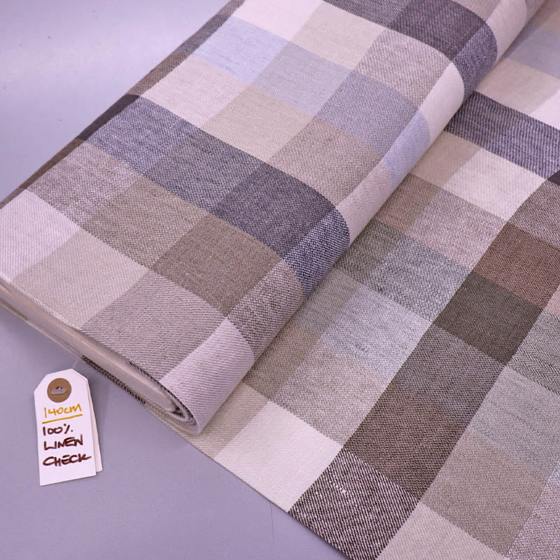 100% Linen Check Linen Dressmaking Fabric featuring a neutral check in beige, brown and grey