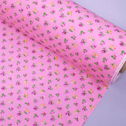 100% Cotton Ditsy Floral Pink Poplin Fabric - pink and yellow flowers on sugar pink background