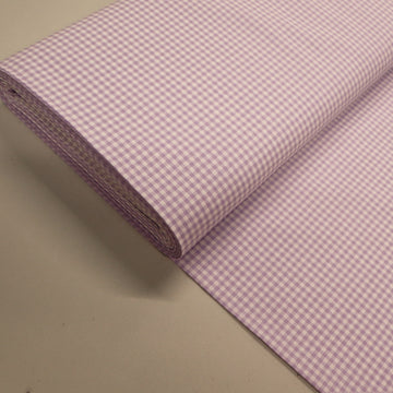 100% Cotton Mini Gingham Dressmaking Fabric featuring a small lilac and white check.