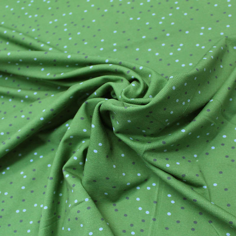 Green spotted cotton jersey fabric dressmaking