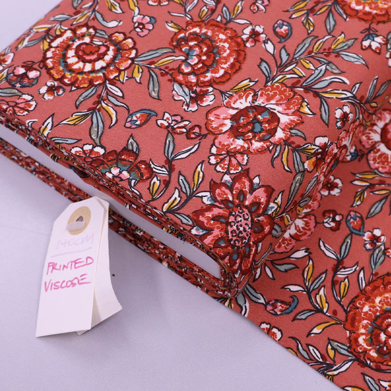 Dressmaking Viscose Brick Orange Flowers Fabrics Galore