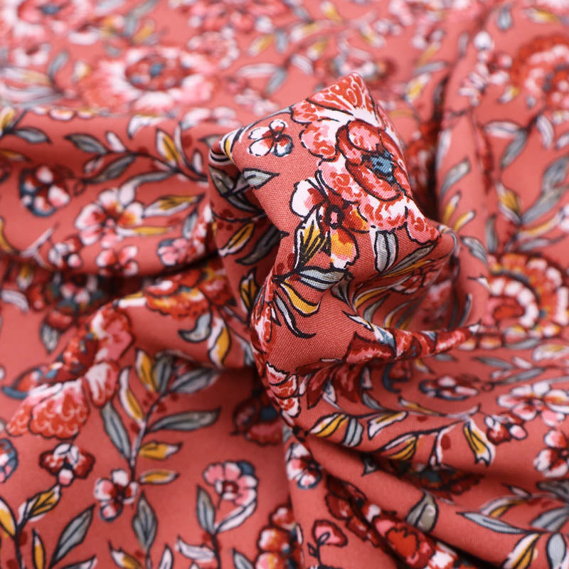 Dressmaking Viscose Brick Orange Flowers Fabrics Galore