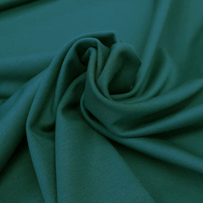 65% Viscose 30% Nylon 5% Elastane
Dark Green Ponte de Roma Fabric