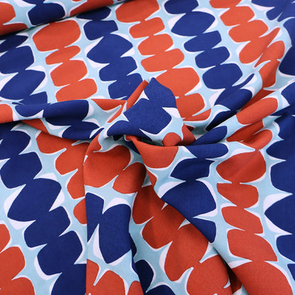 100% Ecovero Viscose Fabric - Dark Blue and Red abstract design on pale blue background