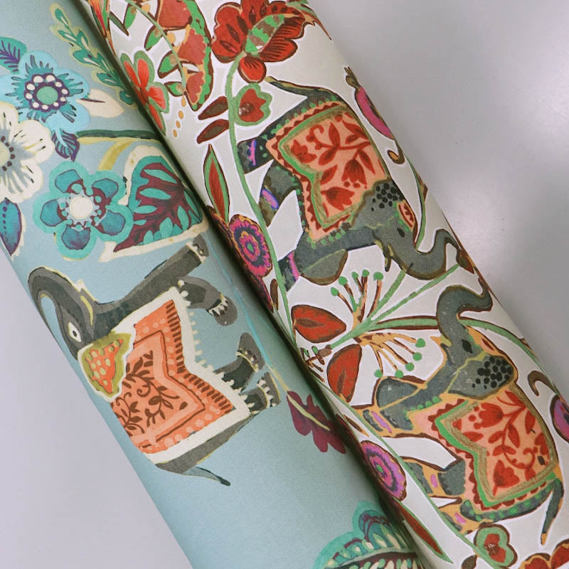 100% cotton panama fabrics in blue and white featuring a tropical elephant and bird print