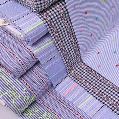 embroidered cotton fabrics in various colours