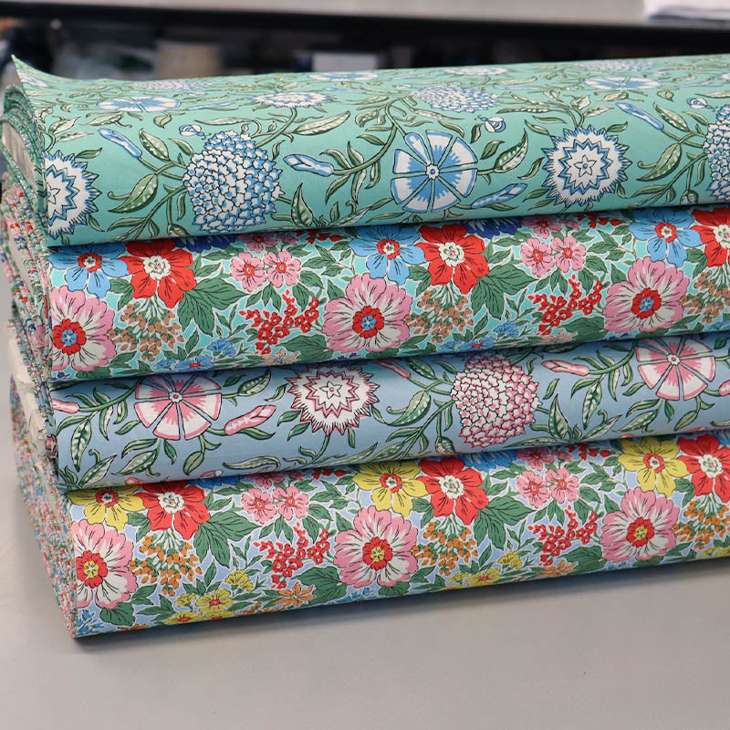 Floral cotton gabardine fabrics and floral cotton poplin fabrics