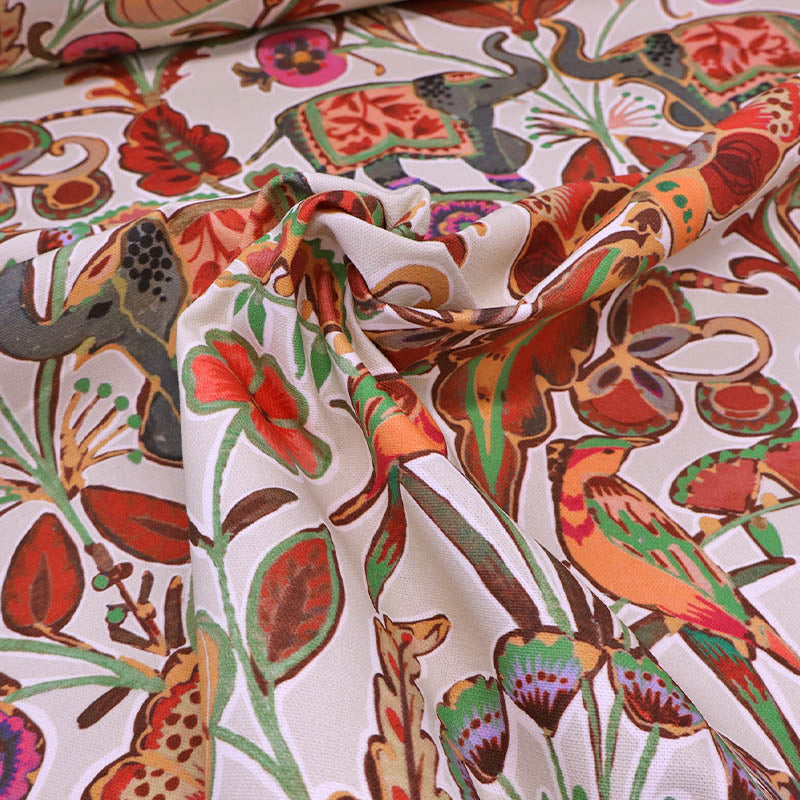 100% Cotton Panama Fabric - Elephant and Bird Tropical Print in red and orange on a white background