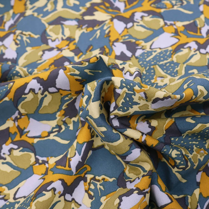 100% Viscose Great Value Green Viscose Fabric with abstract yellow and brown print