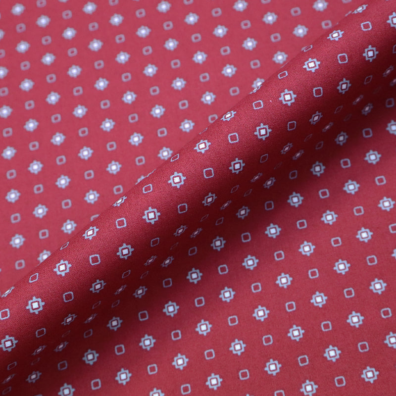 100% Cotton   Red  Printed Cotton Fabric with a grey and white geometric print