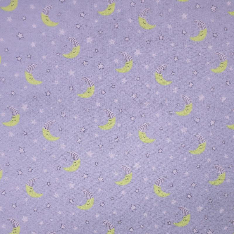 100% Cotton Pale Grey Brushed Cotton Fabric with yellow crescent moons dressed in night caps and with small white stars on a very pale grey background.