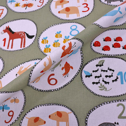 100% Cotton Children's Cotton Fabric - Green Numbers and animals