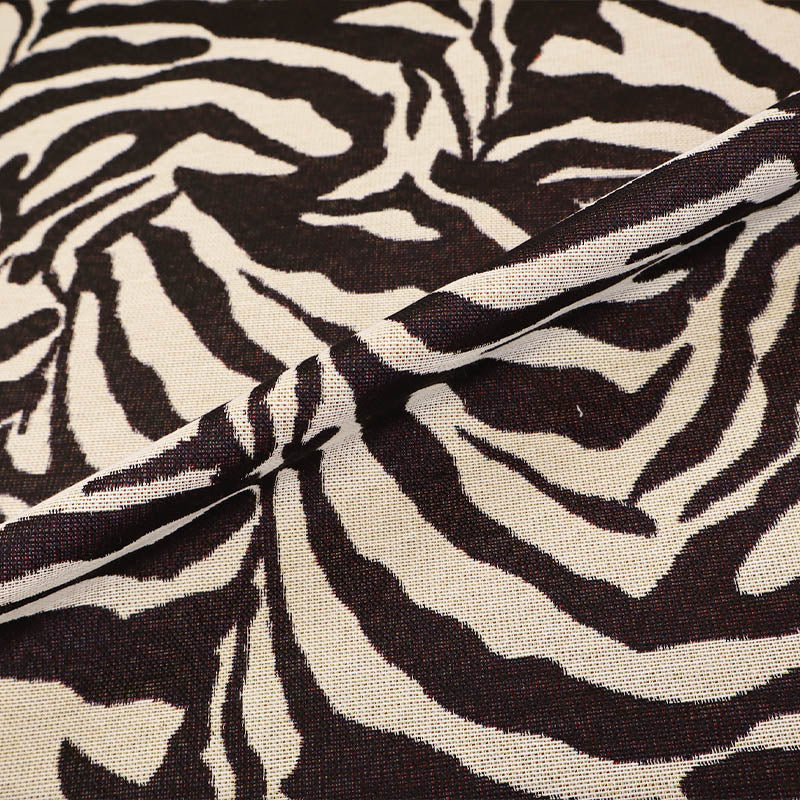 58% Cotton 32% Polyester 10% Acrylic
Zebra Print Tapestry Fabric in black and cream